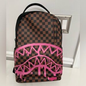 Sprayground Pink drip backpack